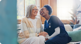 A nurse caring for an elderly woman who needs daily assistance